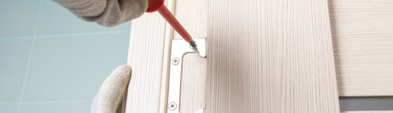 The,Master,Holds,A,Screwdriver,In,His,Hands,And,Installs